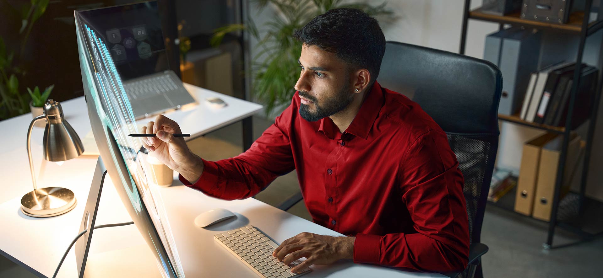 Man sitting at computer monitor