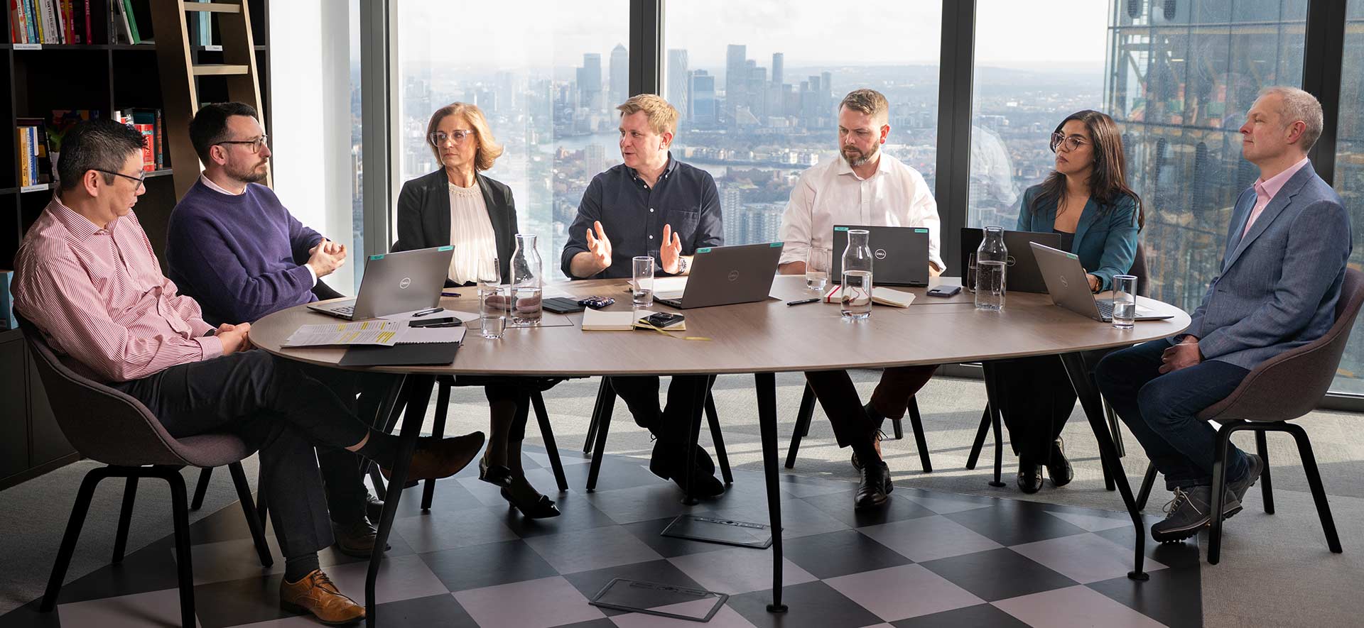 People sitting at conference table