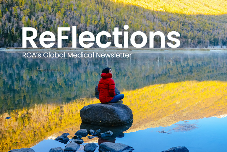 Image - ReFlections - Biometics - 768x514 Woman sitting on rock at the lake