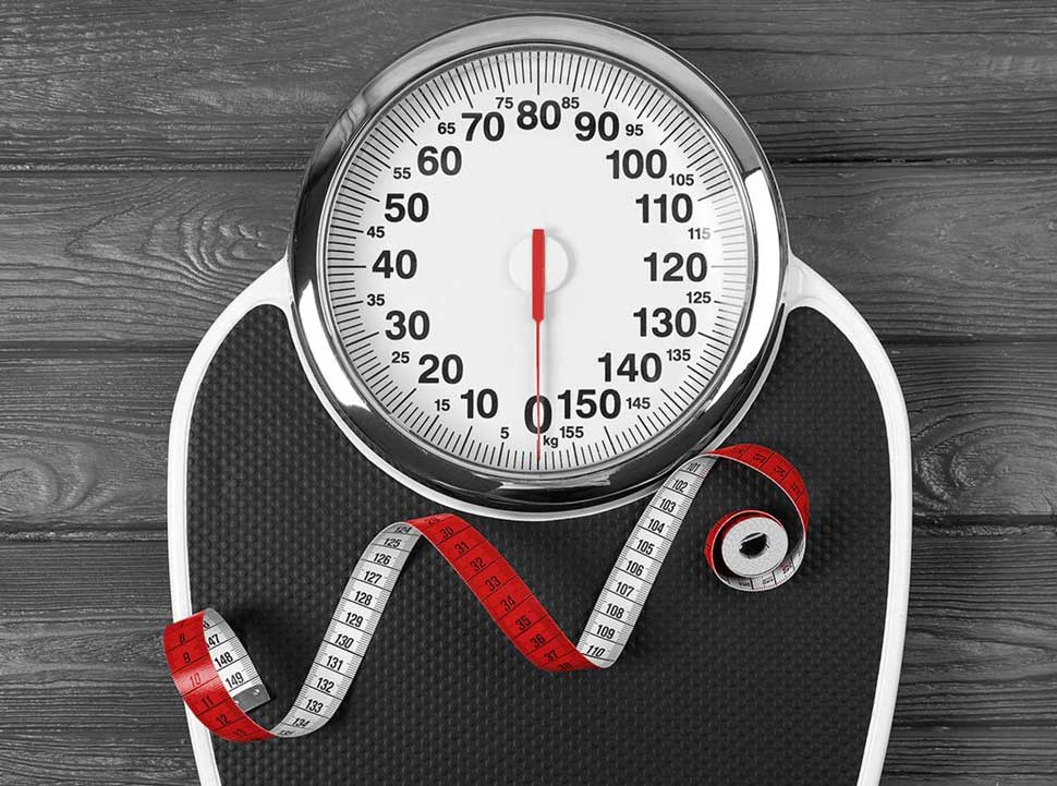 A scale is paired with a measuring tape in bold red
