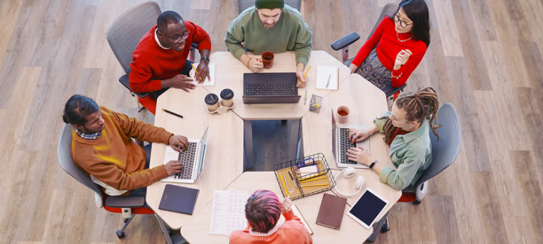 Colleagues working together around one table — the high-quality information that drives accurate PRT outcomes.