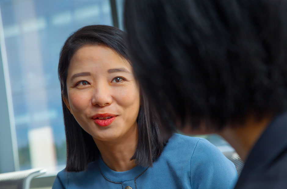 A product development leader, Carmony Wong, from RGA Asia in profile