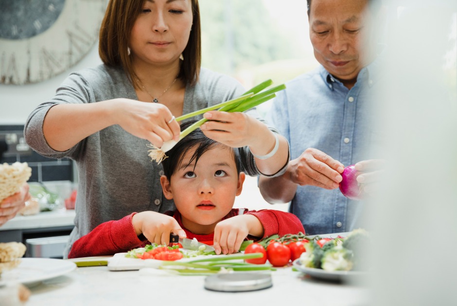 A family prepares a meal, reflecting a surveyed populations