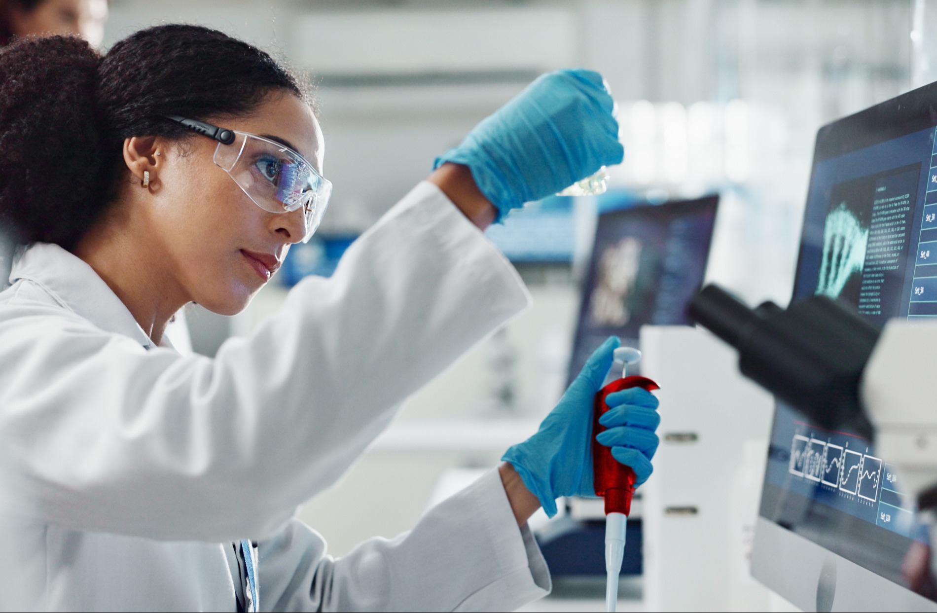 A researcher on a lab bench represents medical research analyzed by RGA.