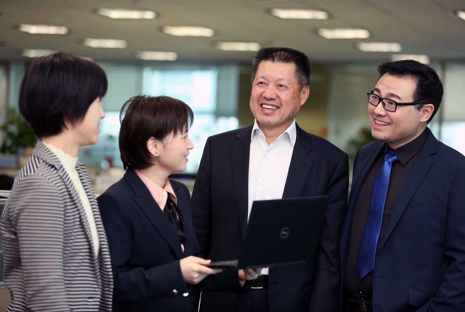 Jason Ou meets with colleagues at RGA China in Beijing
