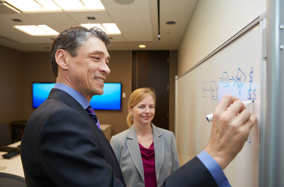 Brainstorming session featuring two colleagues at RGA