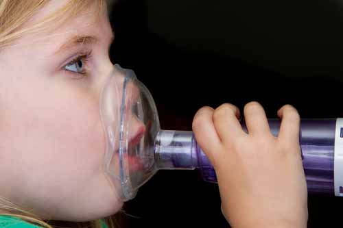 Child receiving oxygen ventillation