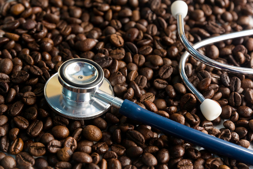 An image of coffee and a stethoscope
