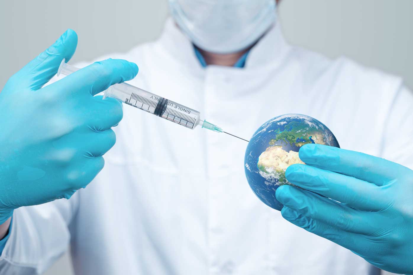 Image of a nurse injecting vaccine into the world