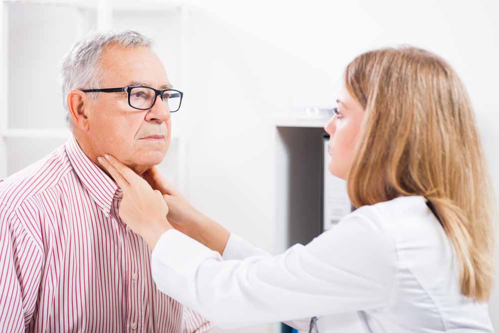 Physician exam of thyroid and neck for cancer