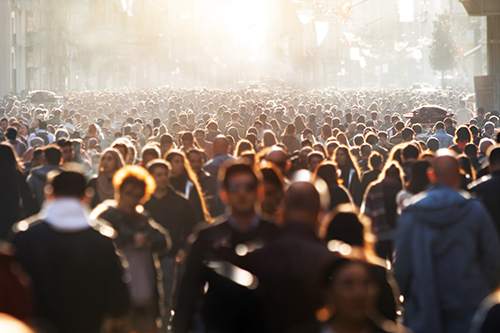 leicester paternership:  population crowding the street