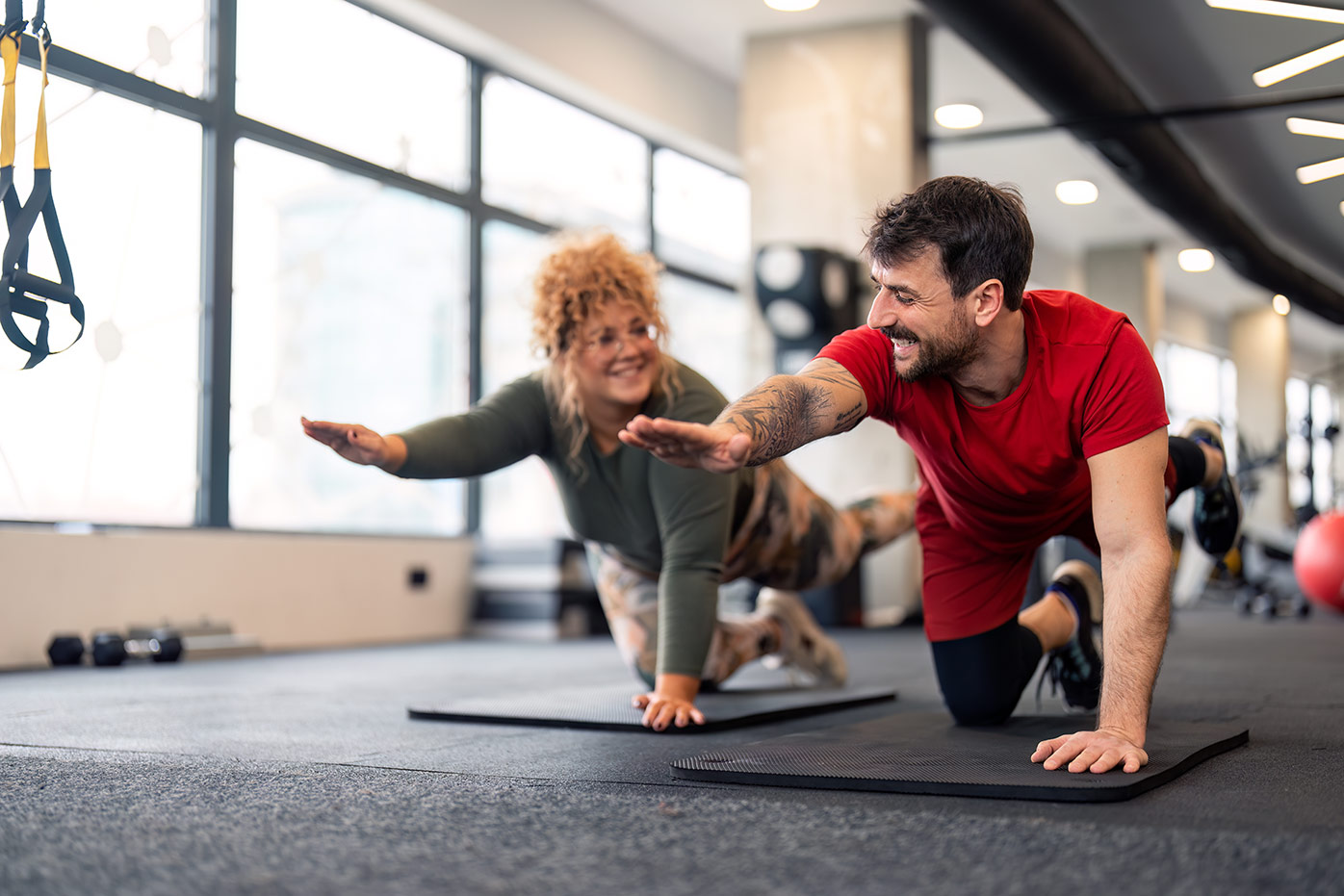 Man and woman stretching