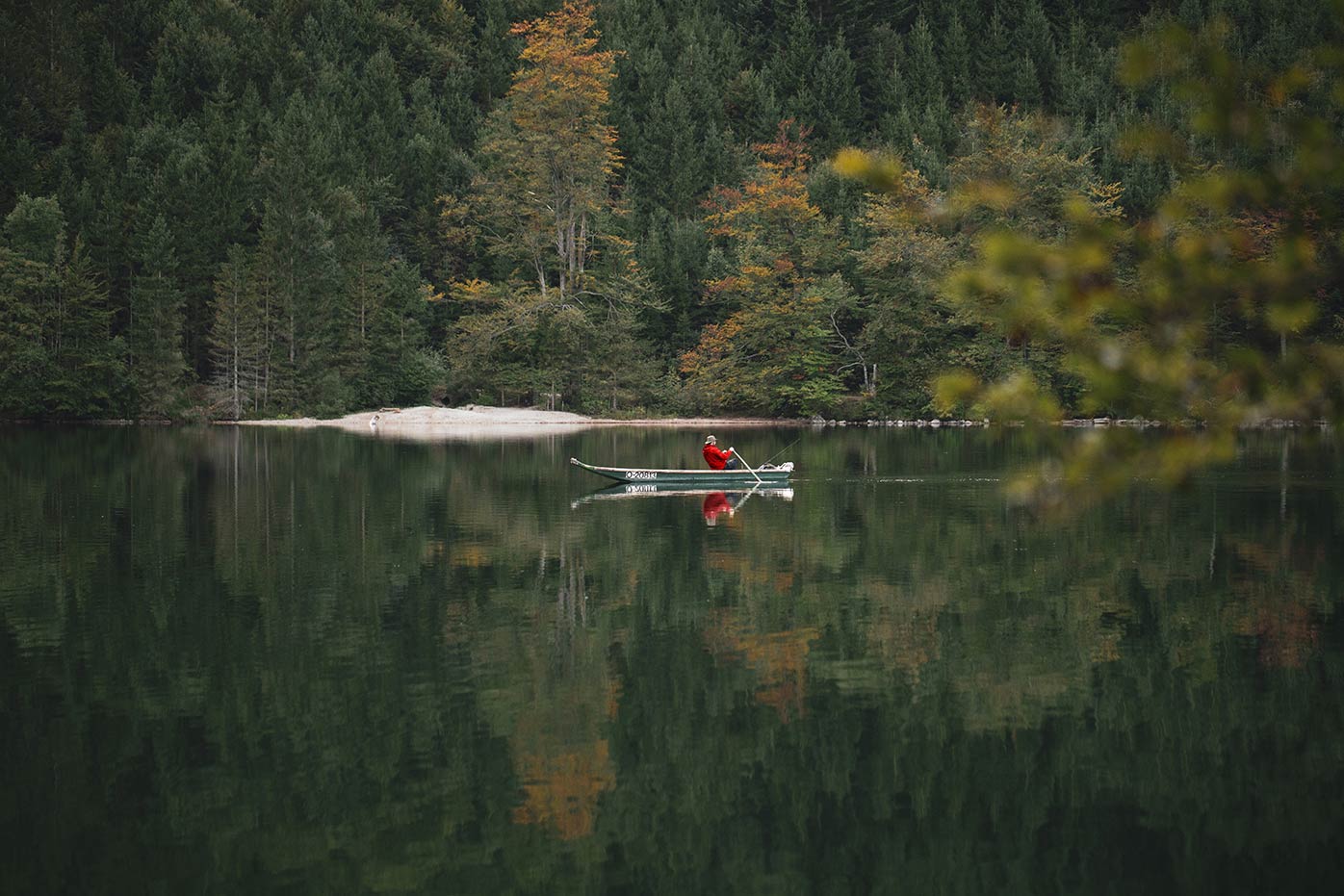 A man rowing on a lake