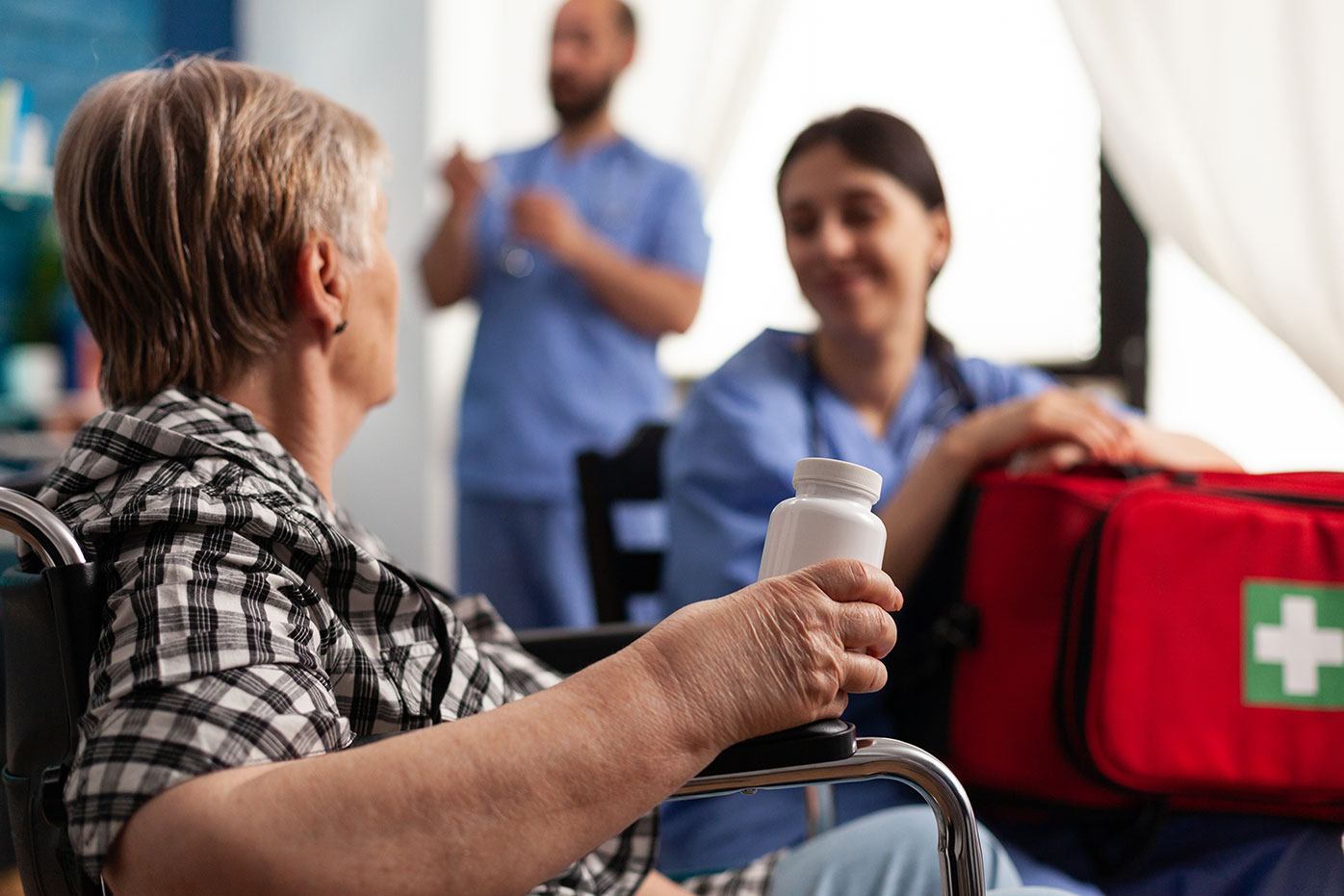 Medics with patient in her home