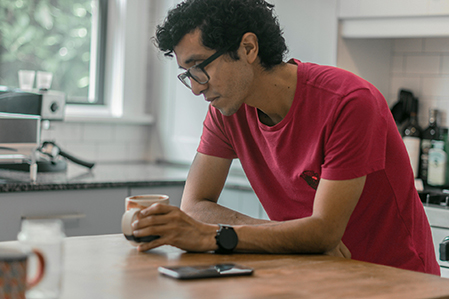 Man in thought while drinking coffee