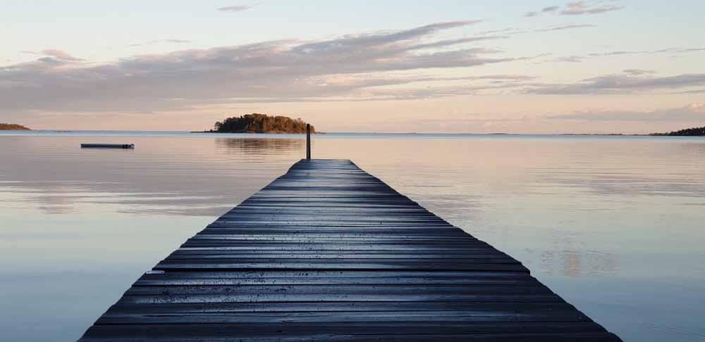 View of pier facing lake at sunset