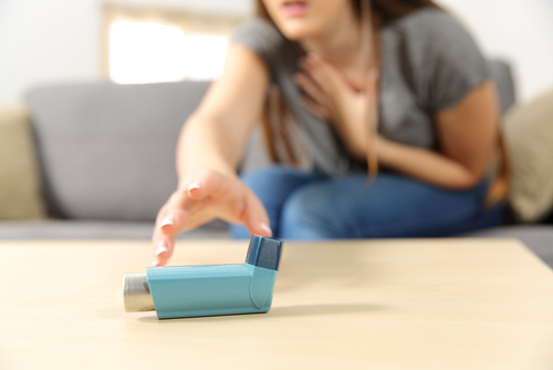 Asthma: Woman reaching for inhaler