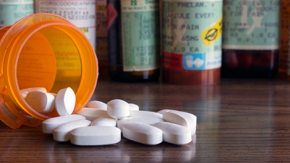 Opioid tablets and pill cases