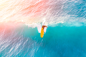 Surfing image with yellow board
