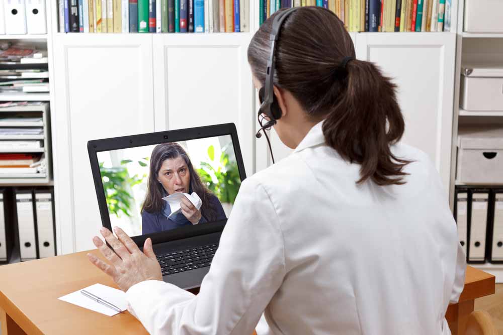 Doctor conducts Telemedicine consultation
