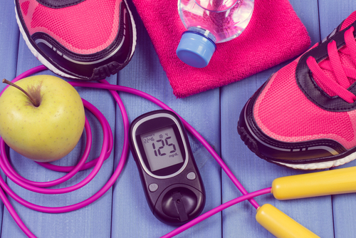 Exercise, apple, diabetic blood sugar monitor and jumprope