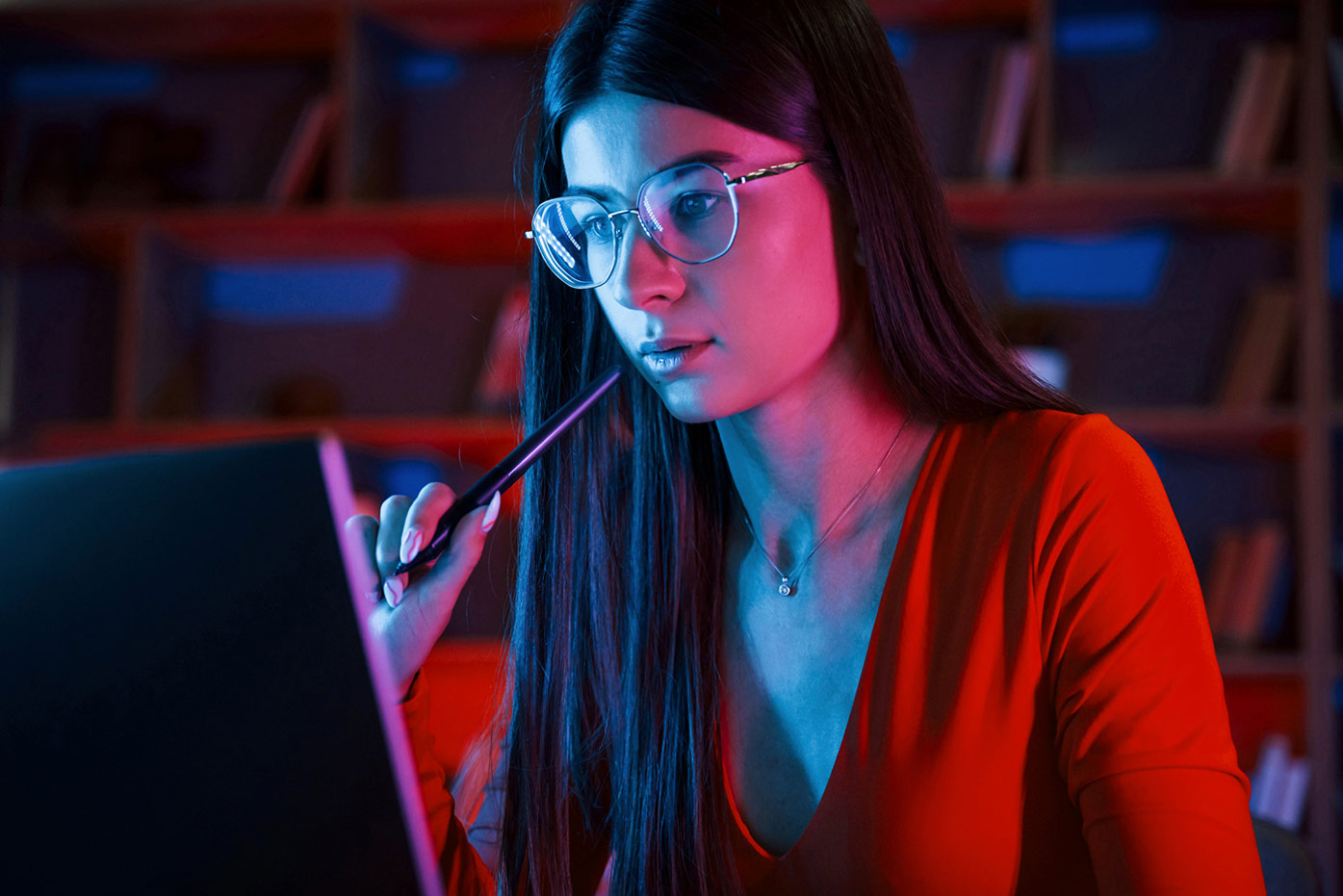 Woman looking at a computer monitor