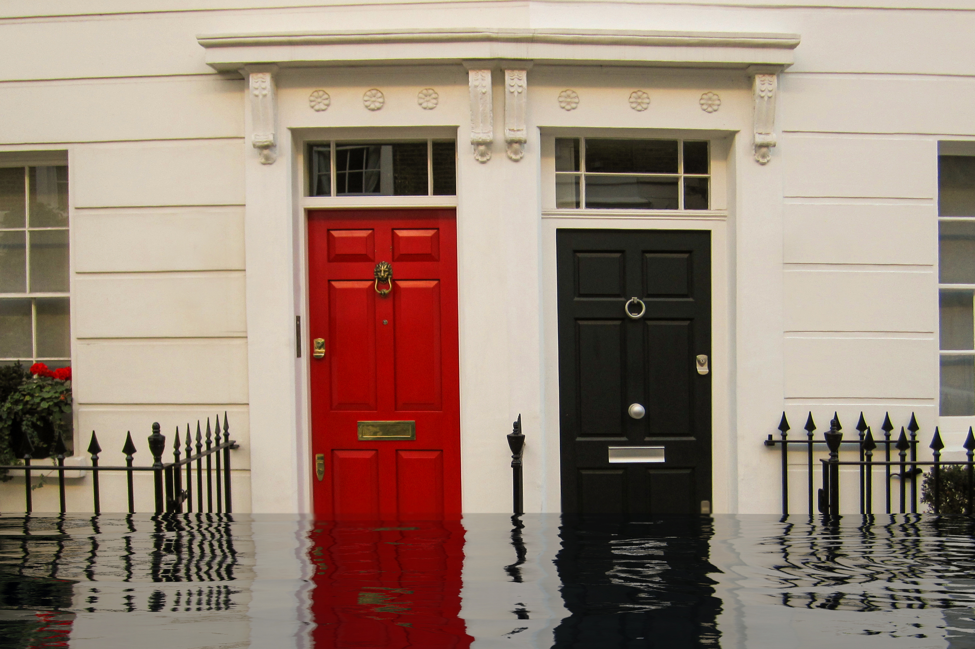 Flooded street by London flats