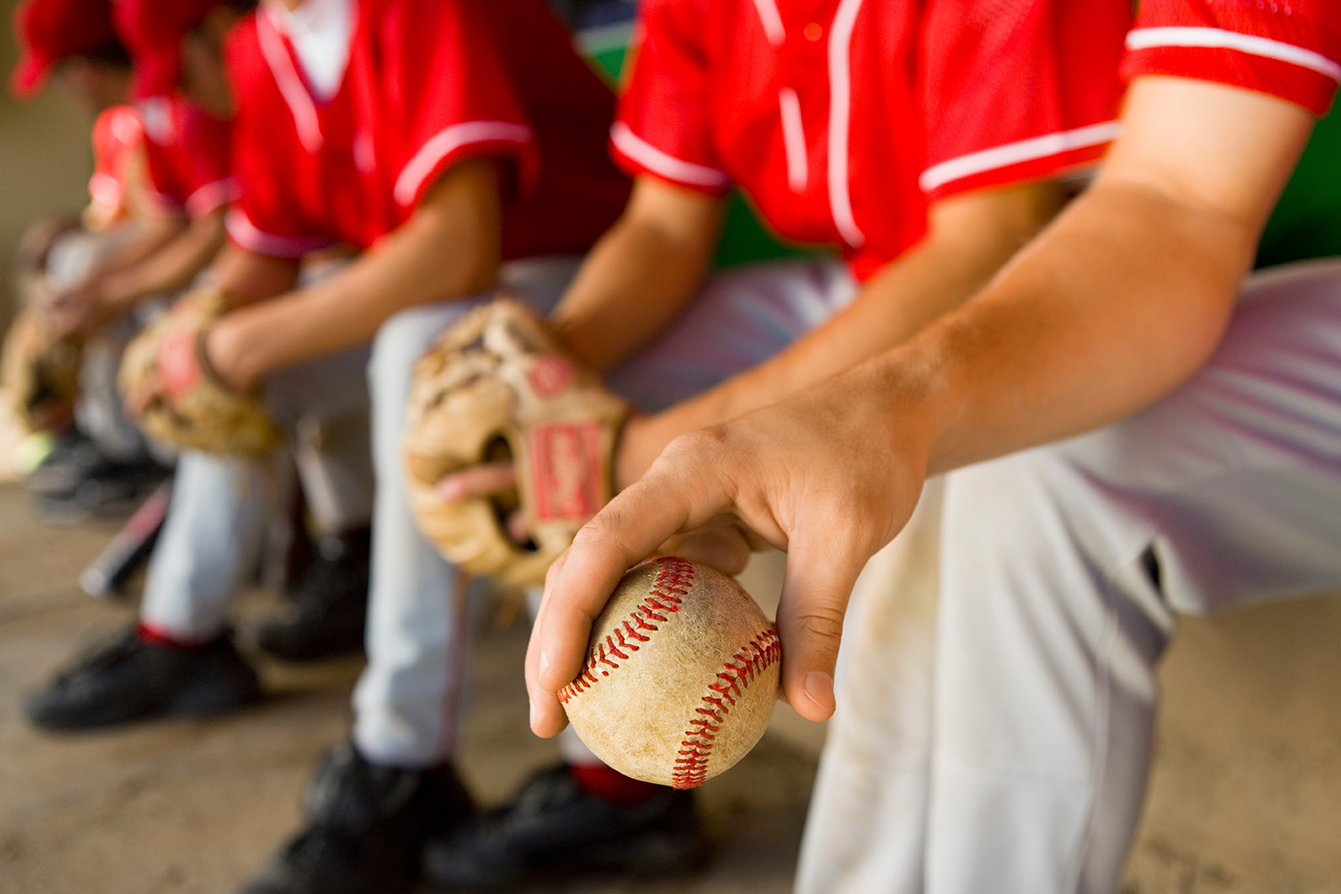 Baseball player holding a baseball