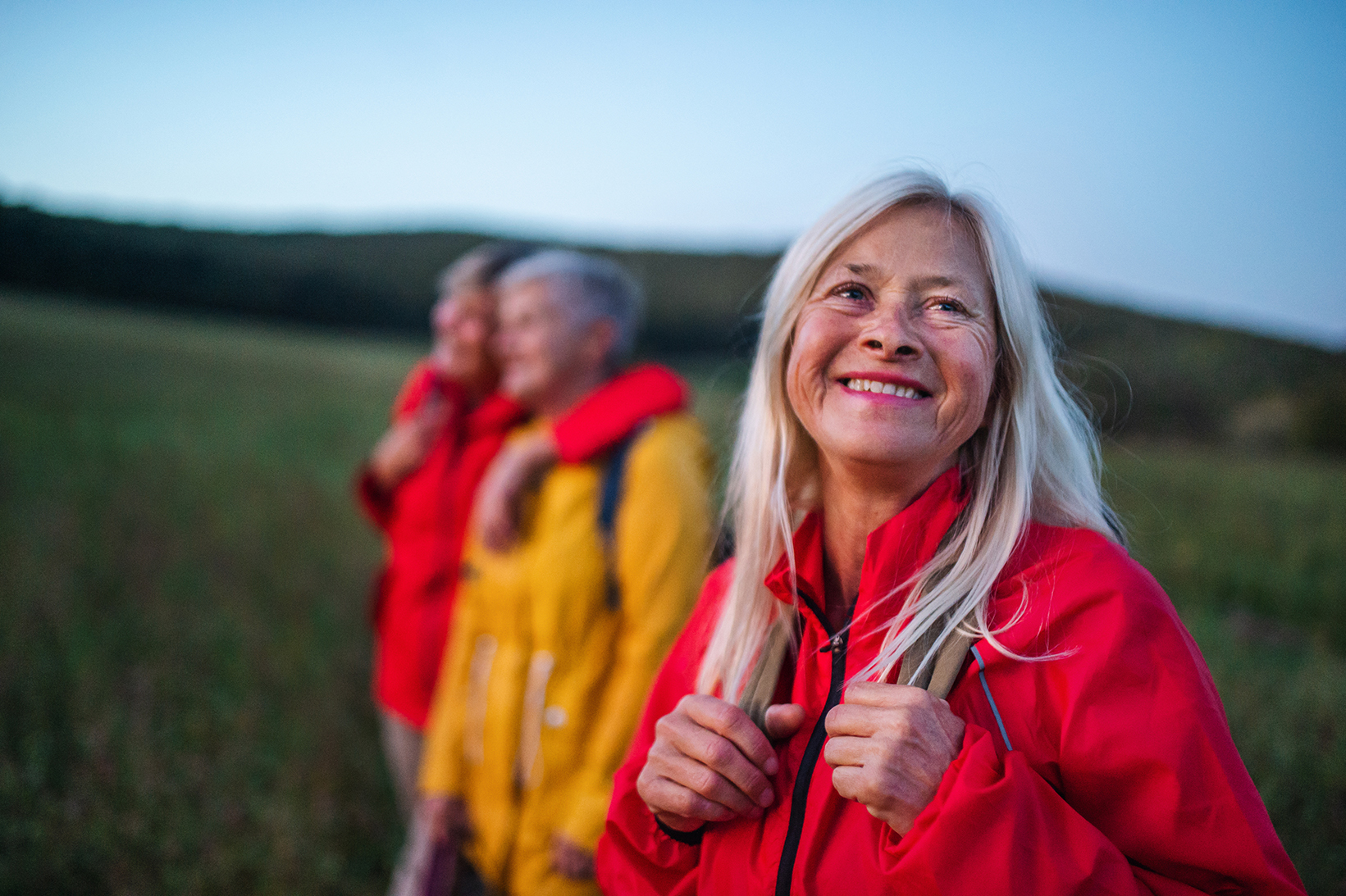 Middle-aged woman outside enjoying nature