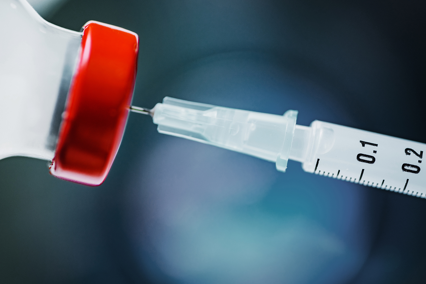 Needle in a vial of medicine
