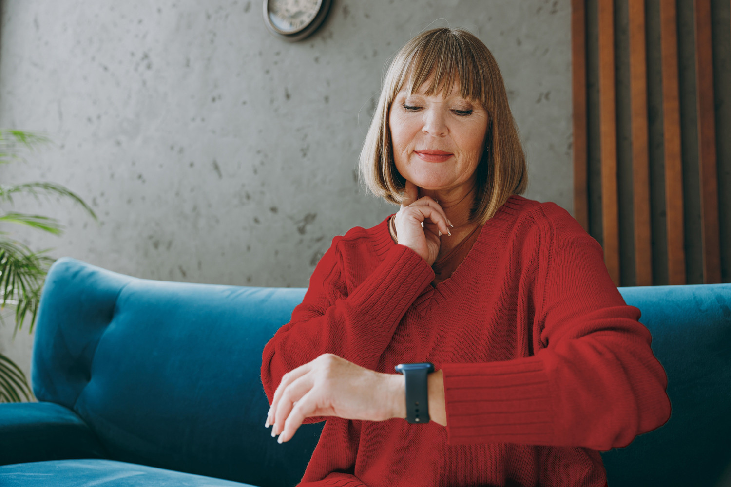 A woman checking her pulse/heart rate