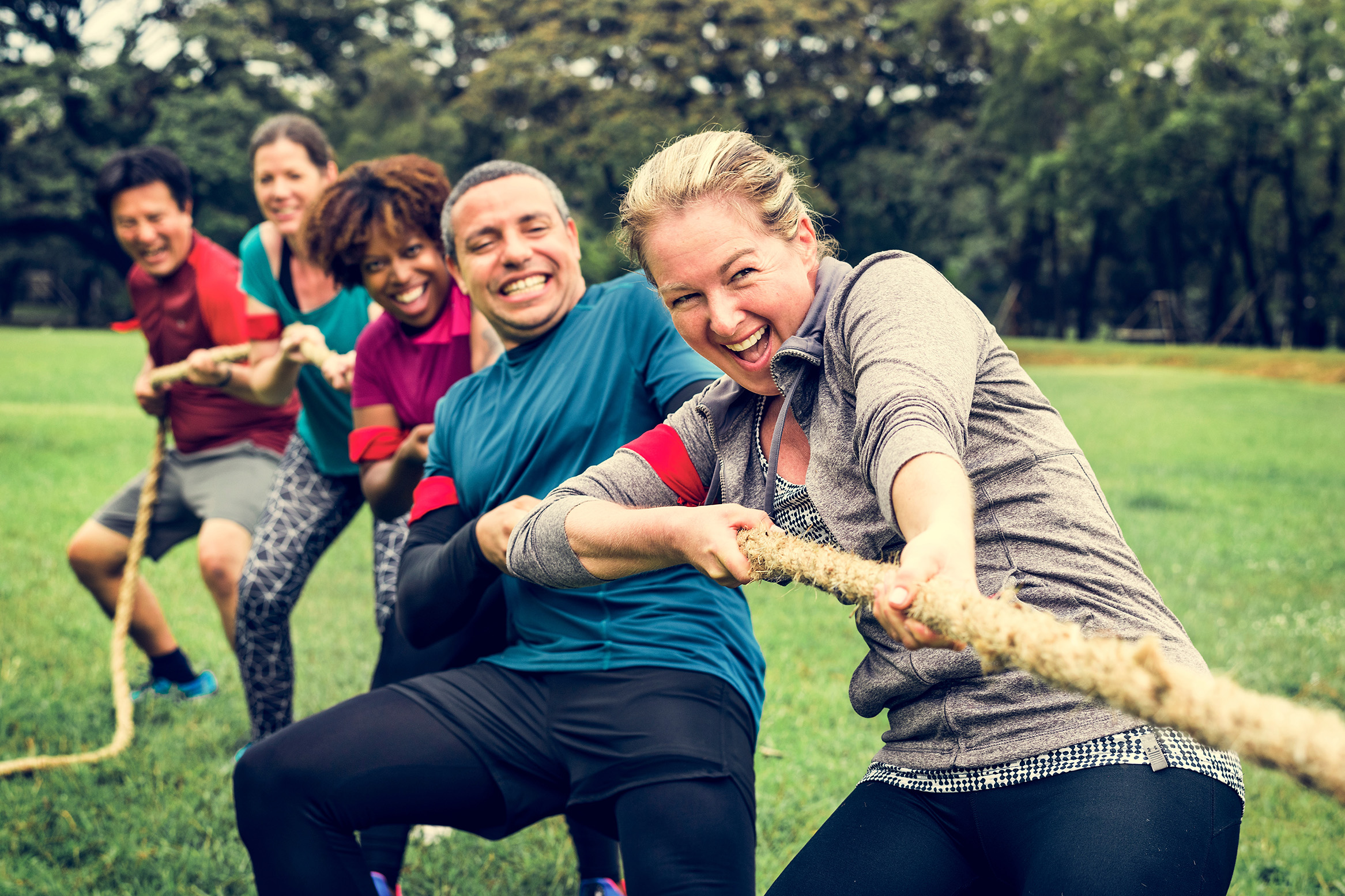 Adults doing a tug-of-war