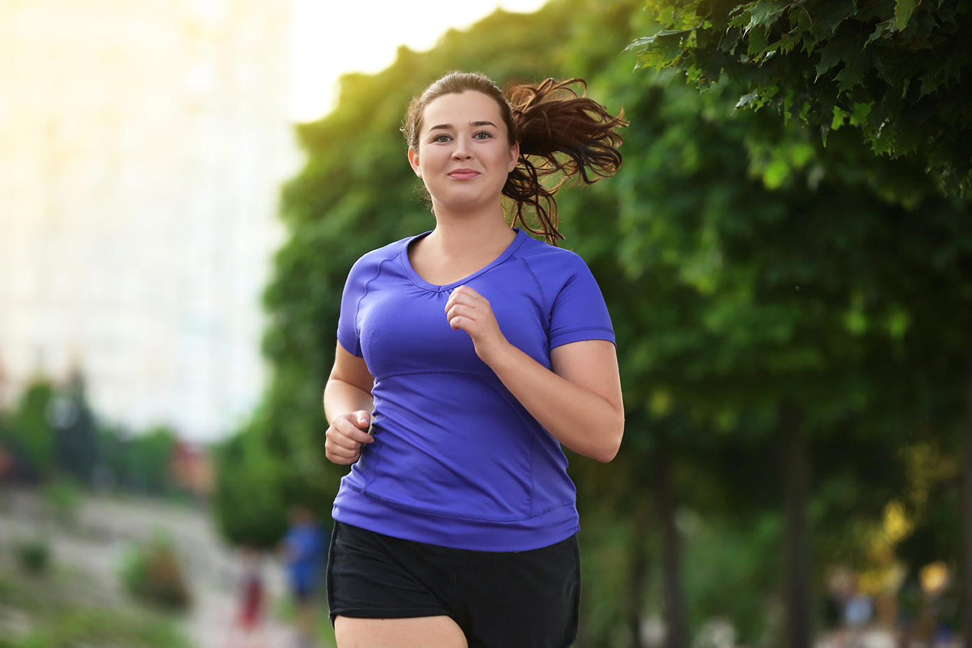 Woman running to lose weight