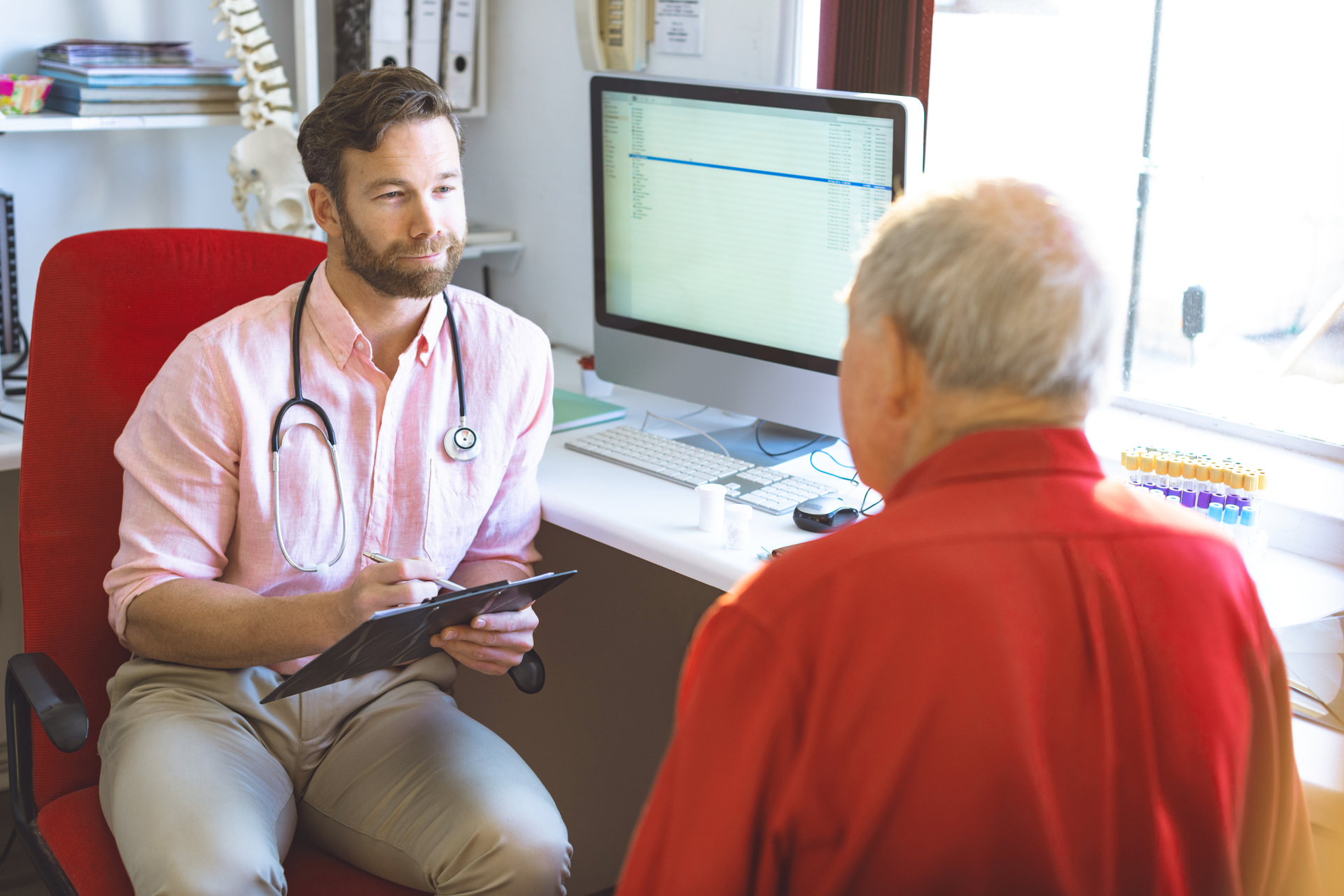 Doctor Speaking with an Elderly Patient
