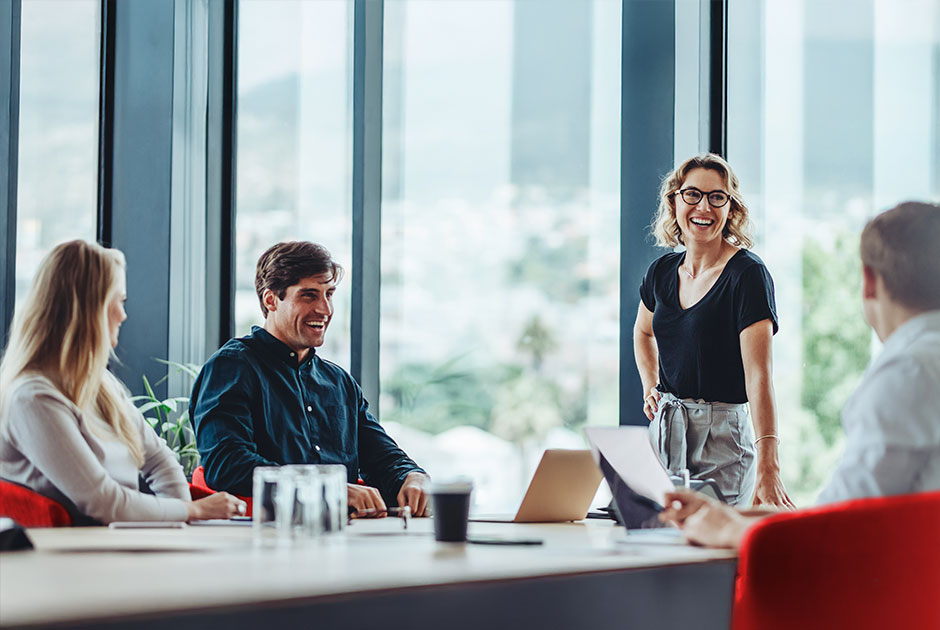 Group of business professionals in a productive discussion at a conference meeting