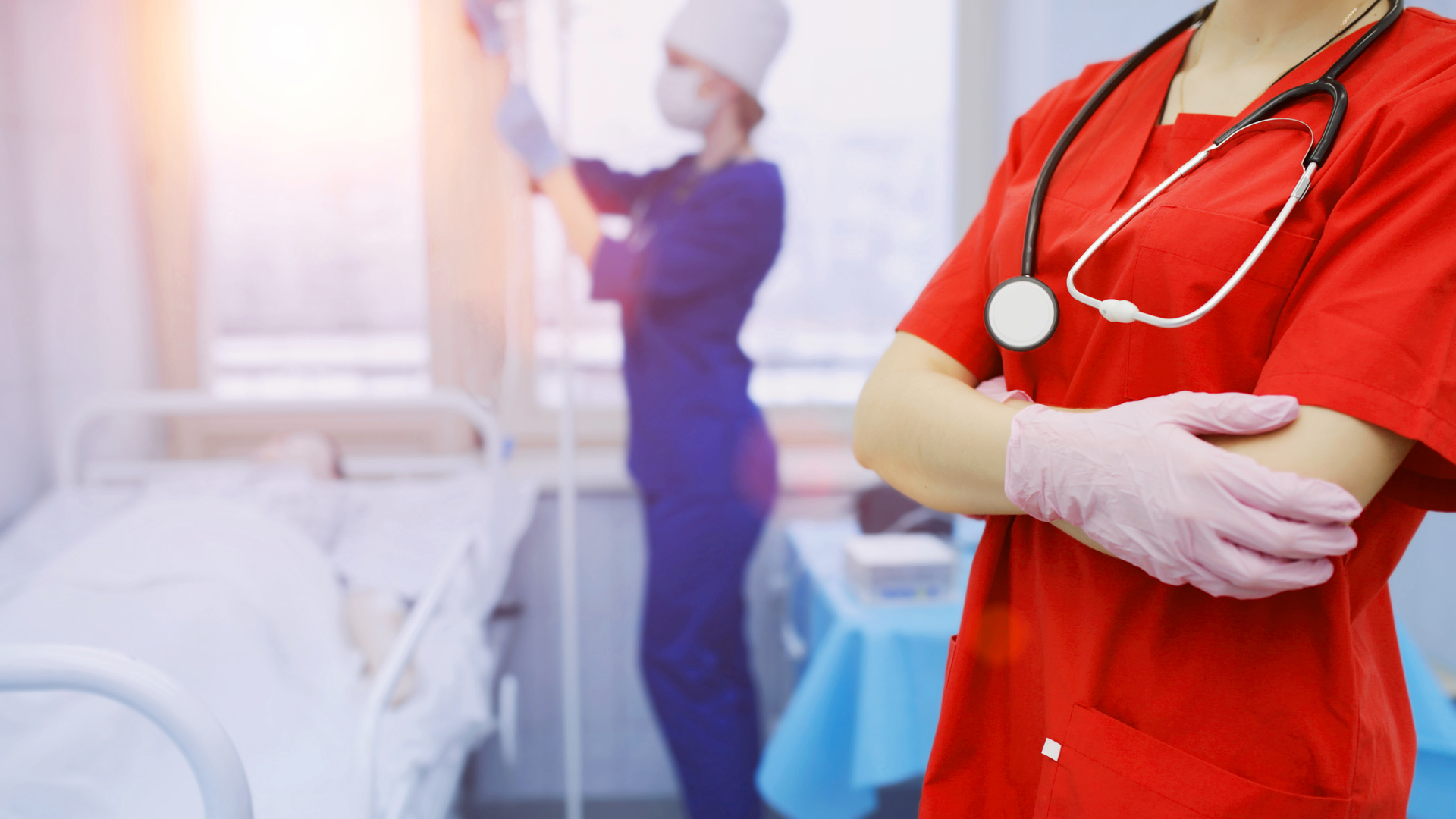 Nurse in red scrubs