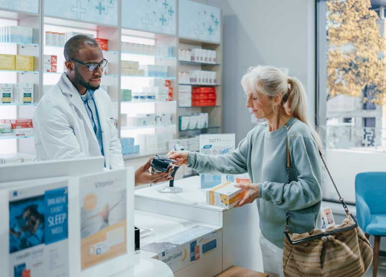A woman visits her pharmacist and discusses her perscription