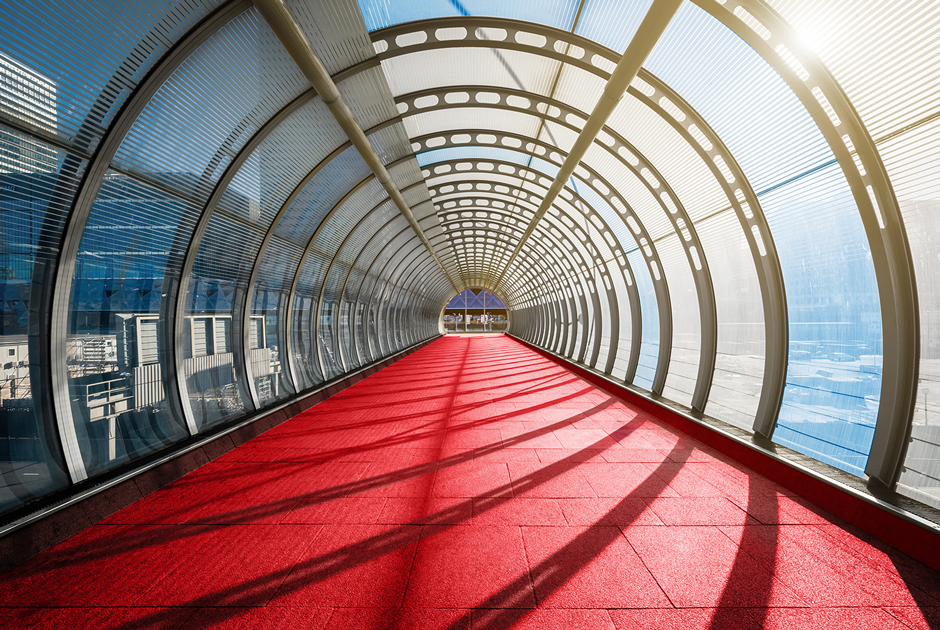 A pathway passes through a light filled atrium