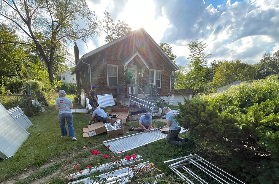 RGA employees building a wheelchair ramp