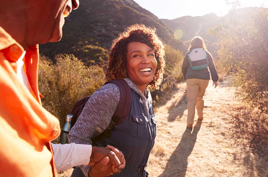 Woman hiking with a companion