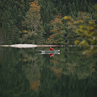 Man rowing in lake