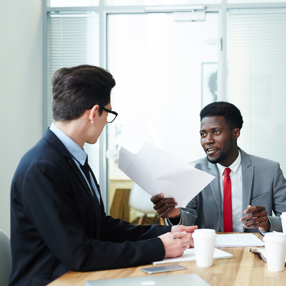 Two businessmen talking