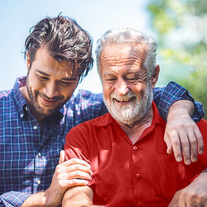 An adult son and his father.
