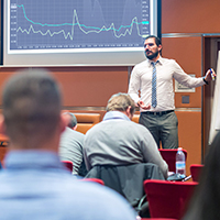 Man making a presentation to other in a room