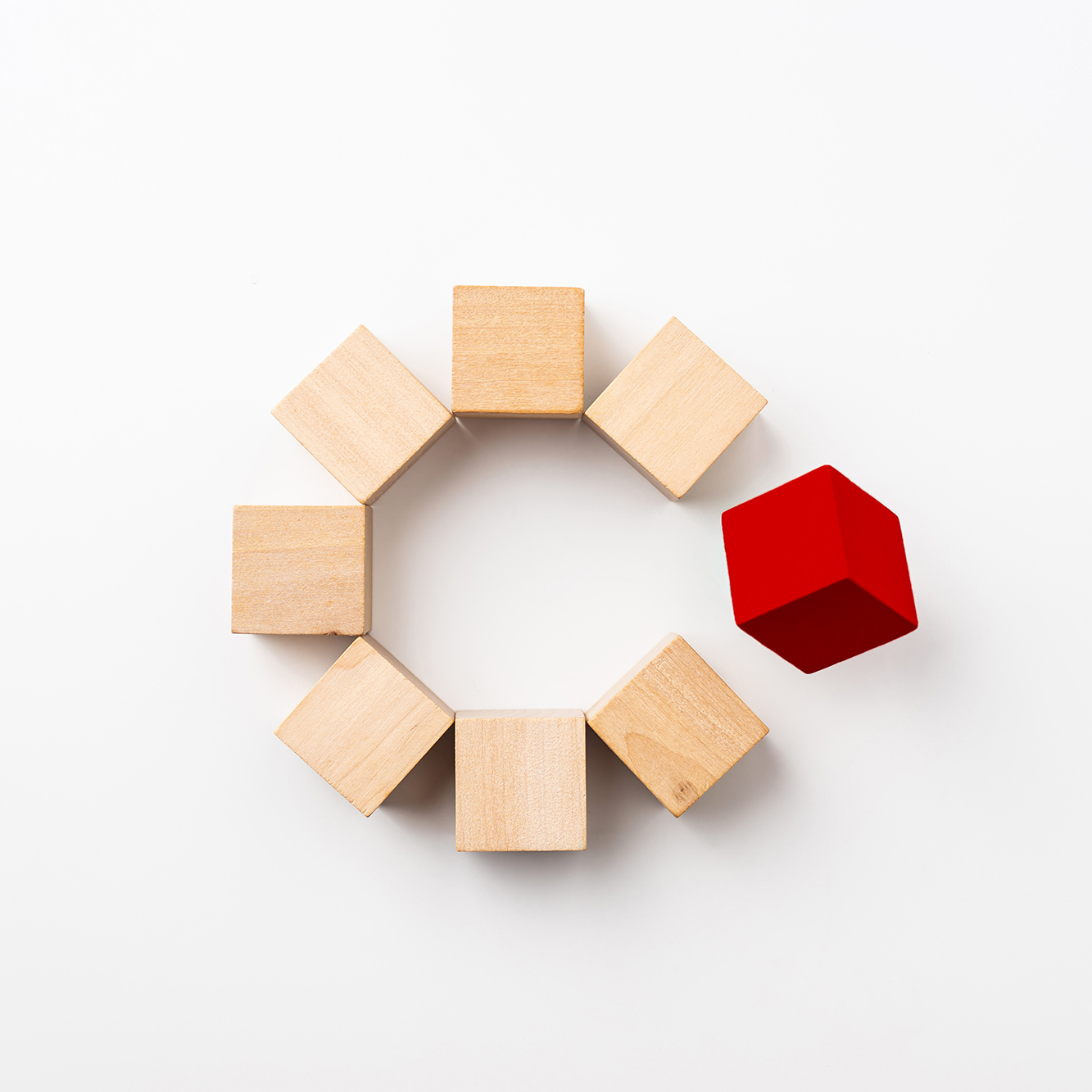 A red block completing a circle of blocks.