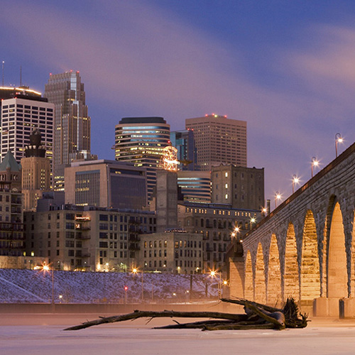Minneapolis city image marking acquisition of Group Re business